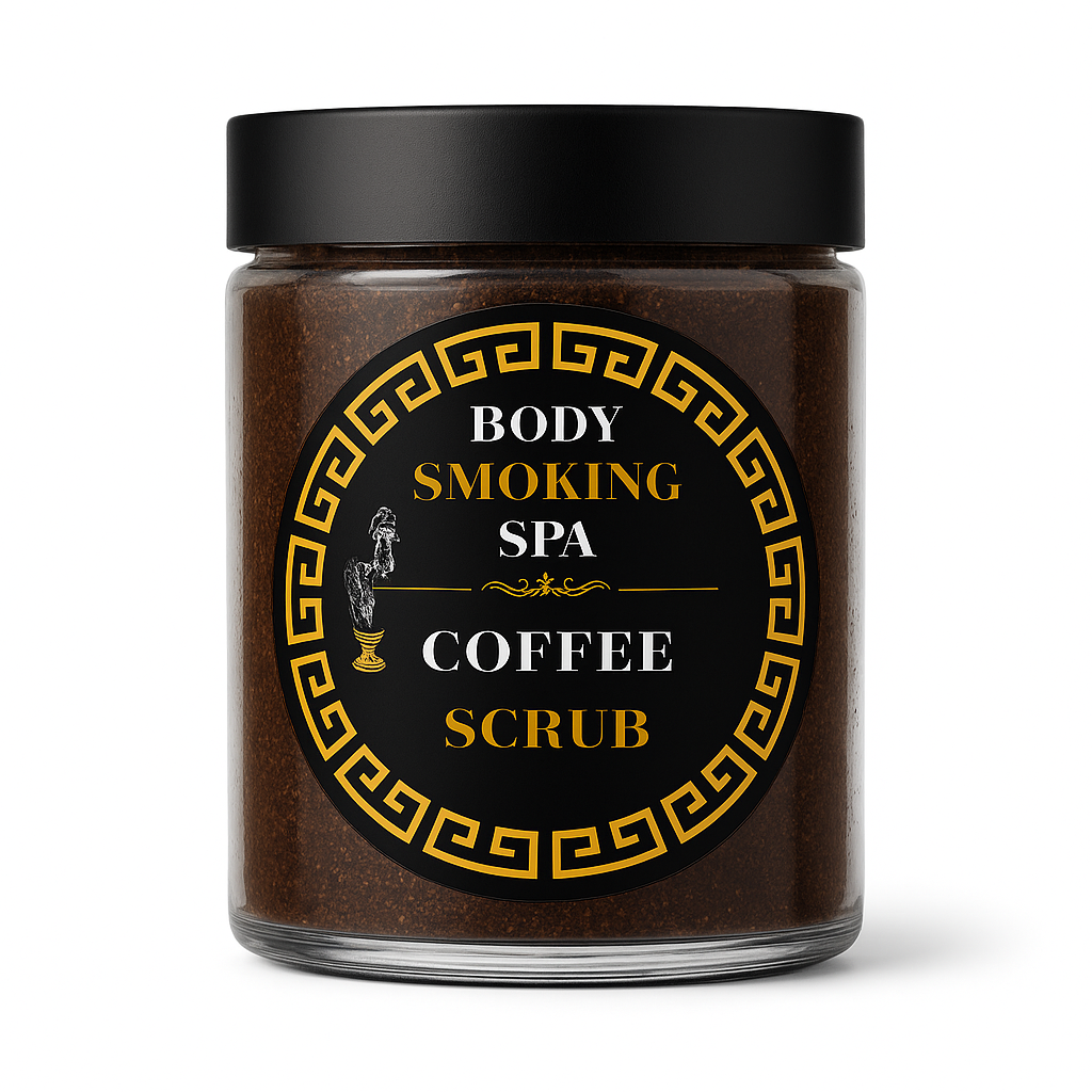 A glass jar of coffee scrub with a black lid and a black label featuring gold Greek key patterns and white and gold text that reads 'BODY SMOKING SPA COFFEE SCRUB'.